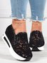 Floral Embroidered Mesh Paneled Slip-On Wedge Sneakers